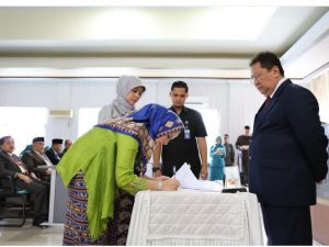 Pj. Gubernur Boytenjuri Saksikan Serah Terima Jabatan Ketua TP PKK dan Dekranasda Provinsi Lampung