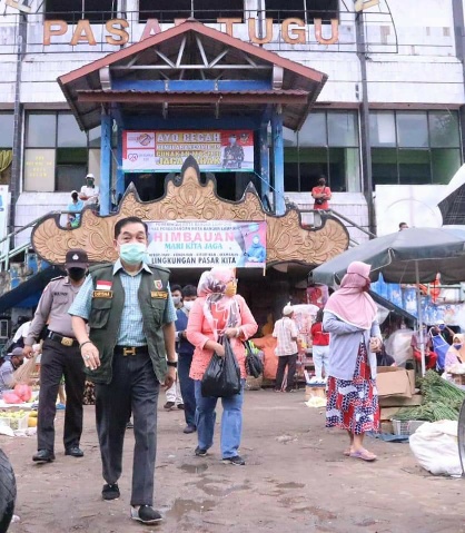 Gugus Tugas Provinsi Lampung Keliling Pasar Sosialisasi Imbauan Pemerintah dan Bagikan Masker