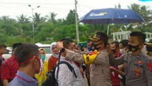 Sosialisasi Penggunaan Masker dan Jaga Jarak Pemilu 2020 di Pesawaran