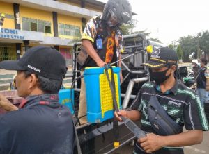 LSM GMBI Distrik Lampung Utara Bakti Sosial Penyemprotan Disinfektan