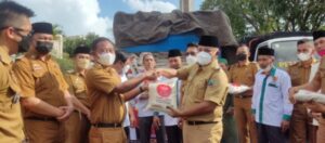 Pemkab Lamsel Bersama Baznas Salurkan Zakat Fitrah 10 Ton Beras